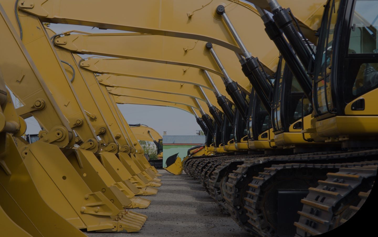 Row of Yellow Construction Excavators on Tracks — Ovannah Hire In West Kempsey, NSW