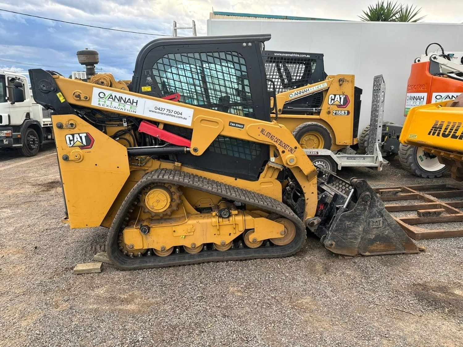 A Yellow Caterpillar Compact Track Loader — Ovannah Hire In West Kempsey, NSW