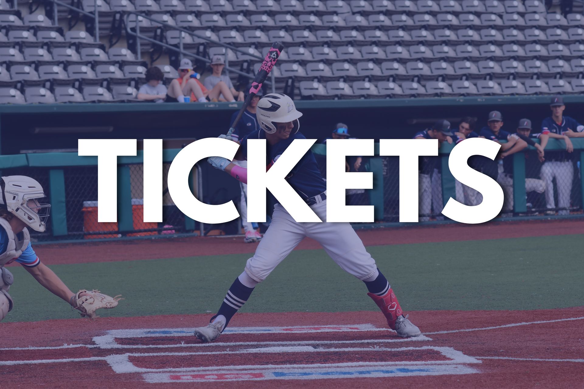 Baseball player at home plate with large “TICKETS” text overlaid on the field