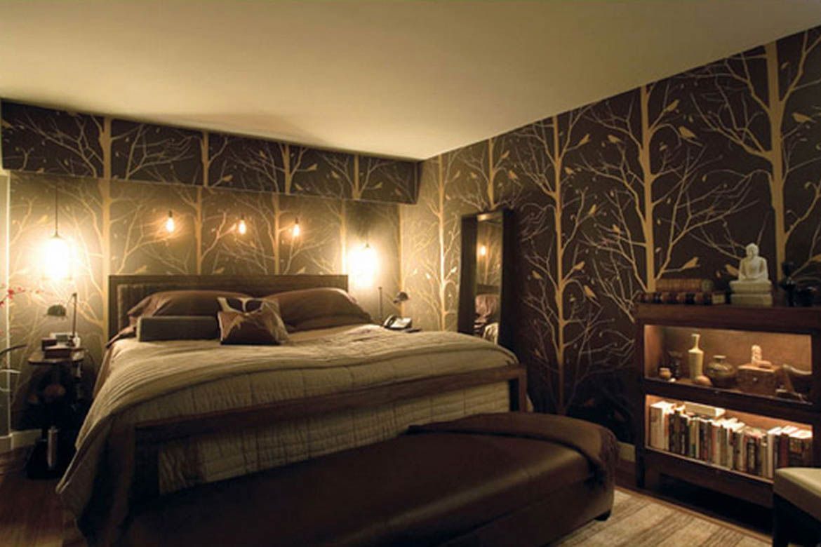 A bedroom with a bed and a bench in front of it