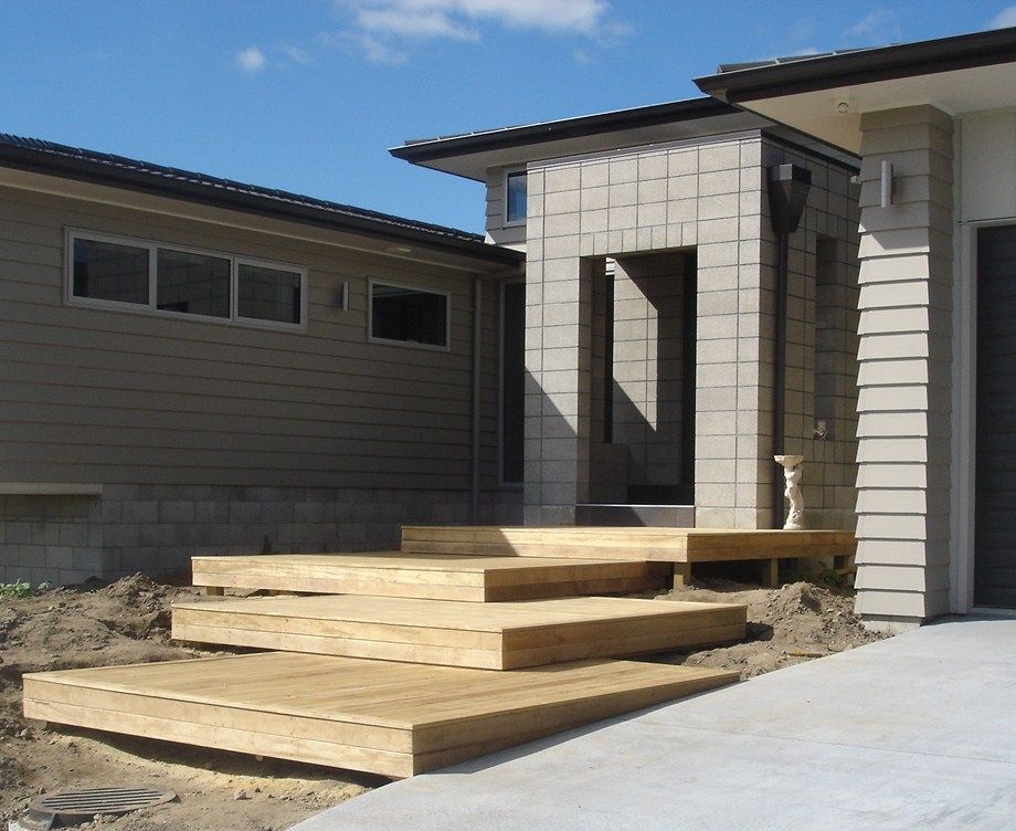 A house with wooden steps leading up to it