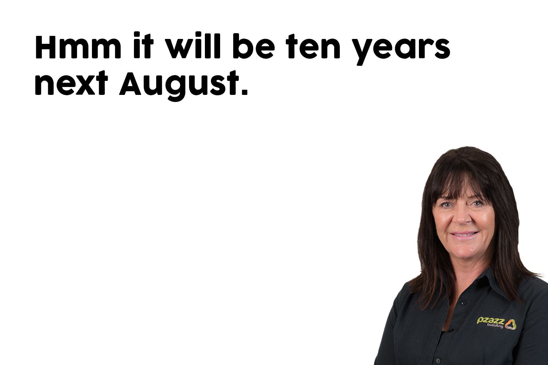 A woman is standing in front of a white background with the words `` hmm it will be ten years next august . ''