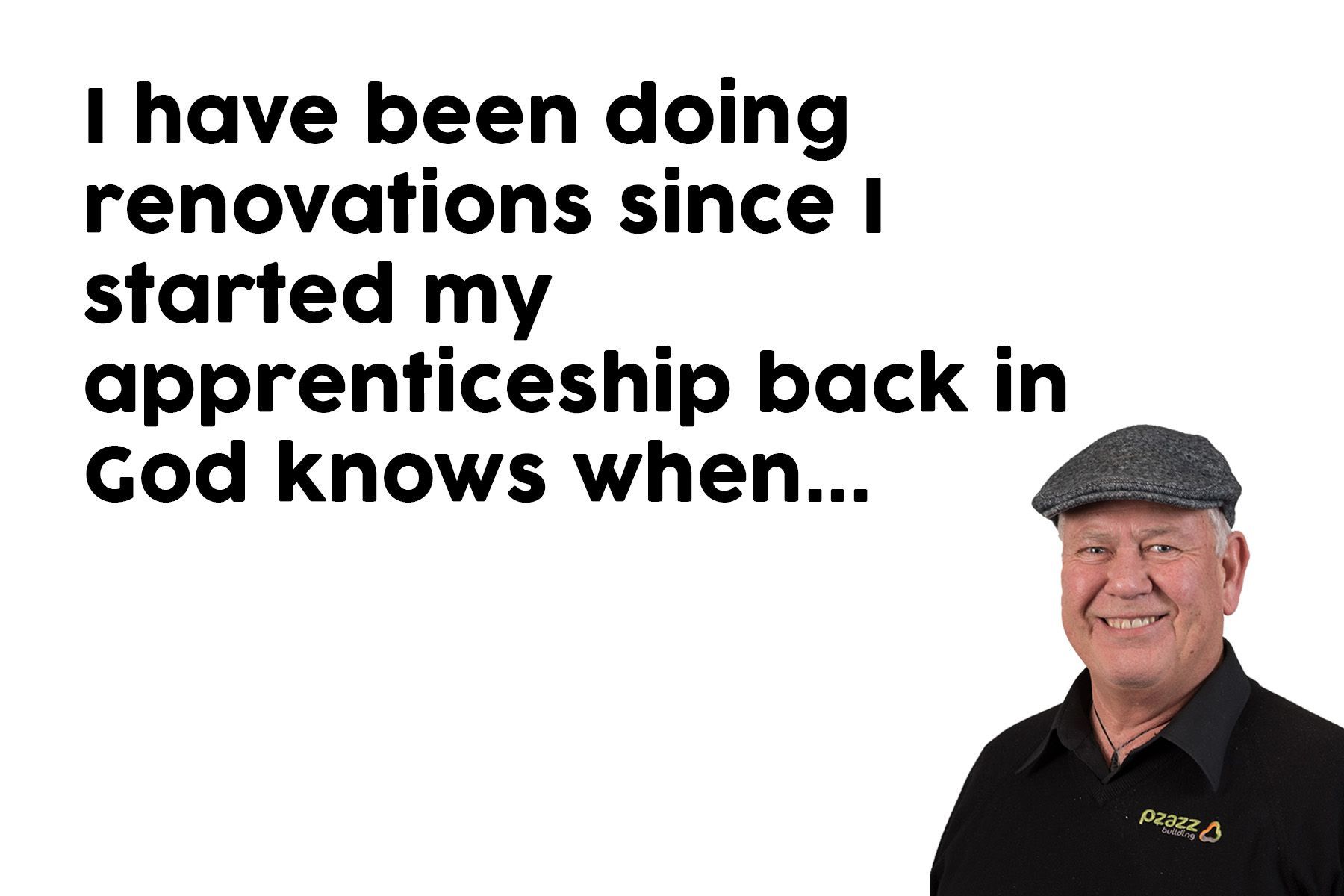 A man is wearing a hat and smiling while standing in front of a white background.