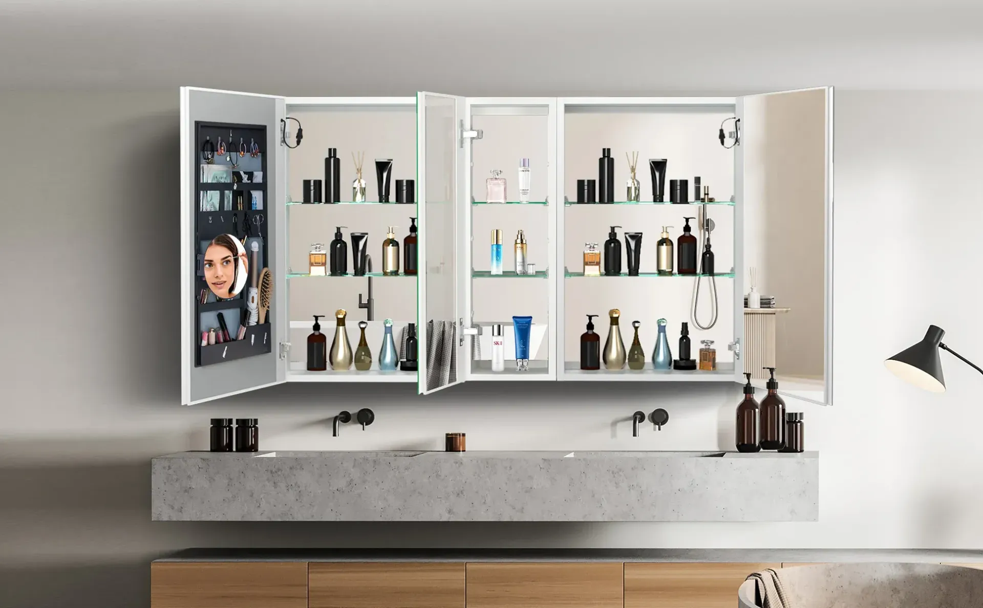 A bathroom cabinet with a mirror and bottles inside of it.