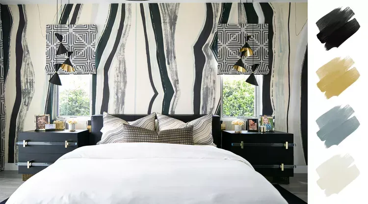 A bedroom with a bed , nightstands , and a zebra print wall.