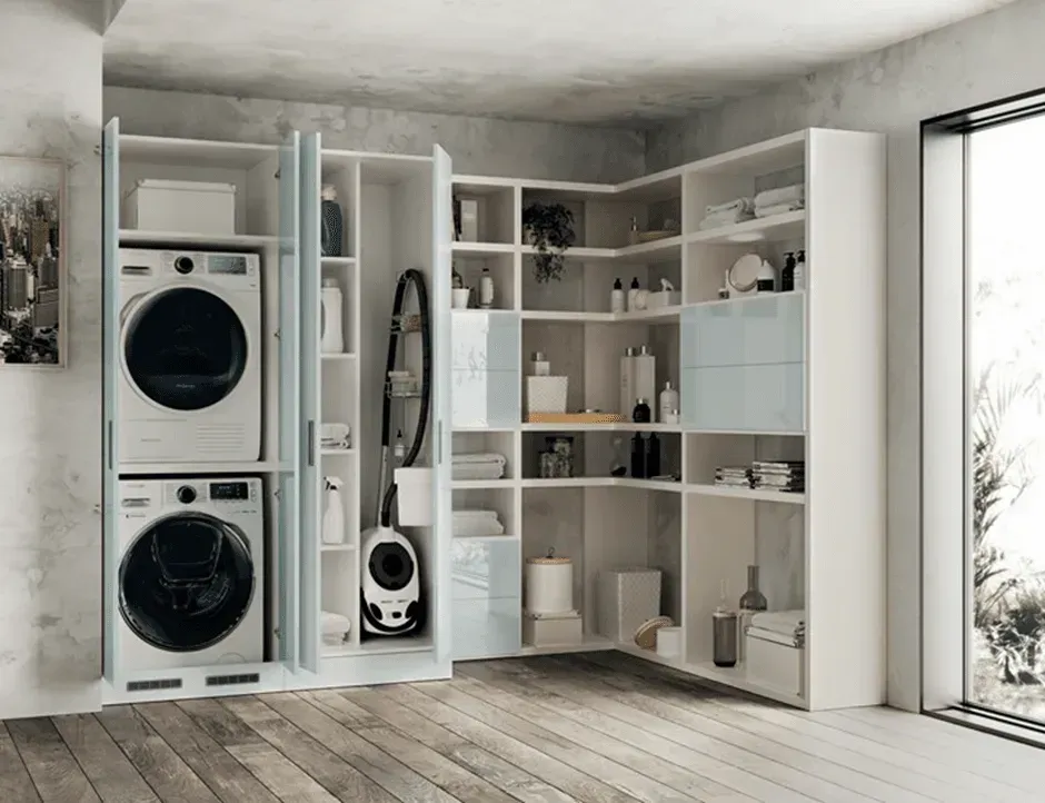 A laundry room with a washer and dryer stacked on top of each other.