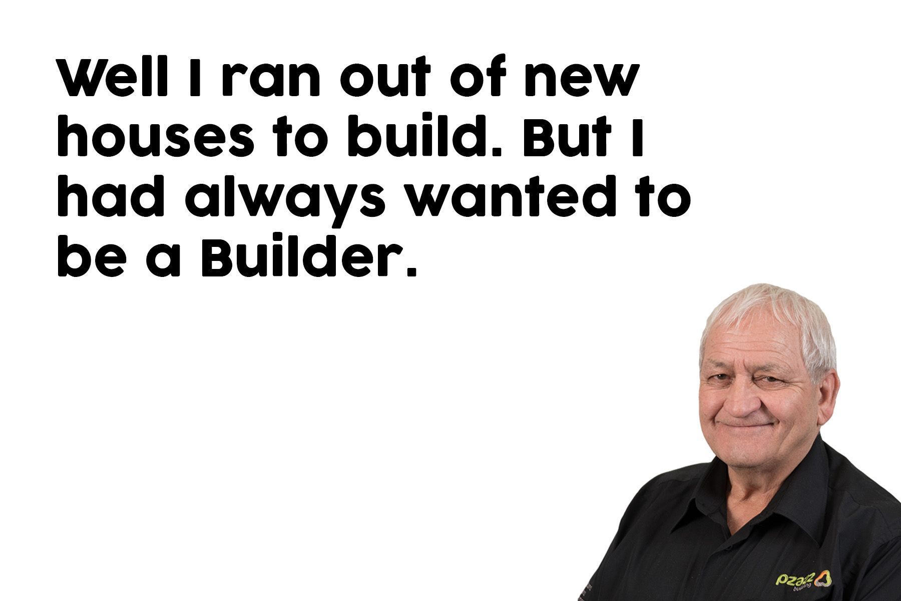 A man in a black shirt is standing in front of a white background.