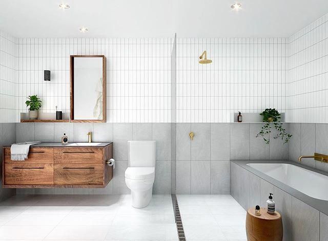 A bathroom with a toilet , sink , mirror and bathtub.