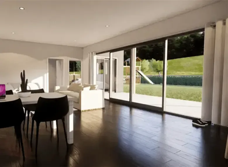 A living room with a table and chairs and sliding glass doors.