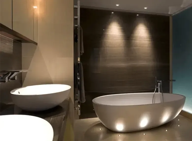 A bathroom with two sinks and a bathtub