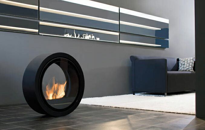 A living room with a fireplace and a couch