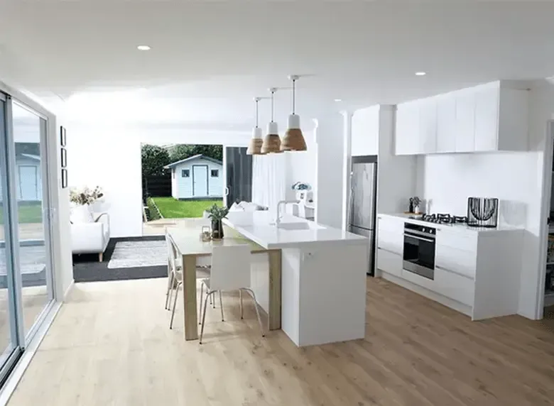 open plan living dining and kitchen spaces