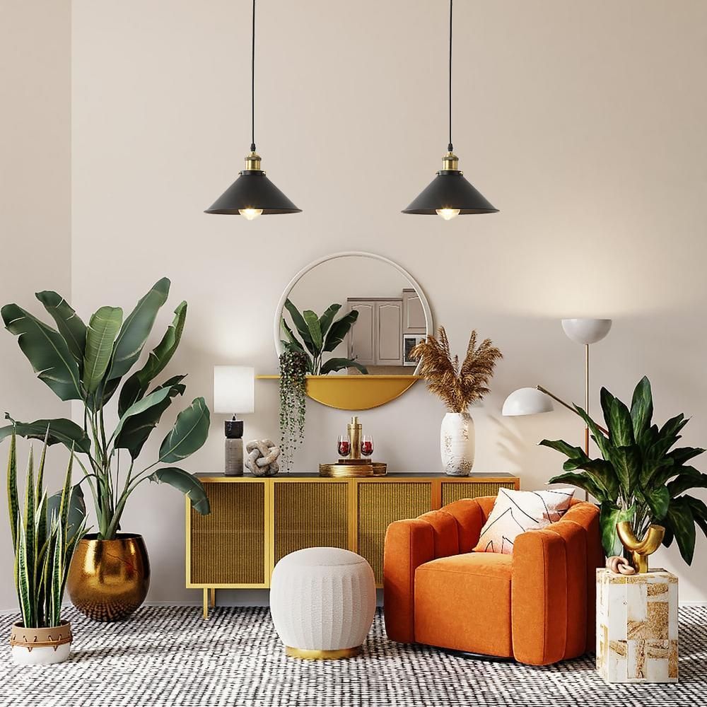 A living room filled with furniture , plants , a chair and a mirror.