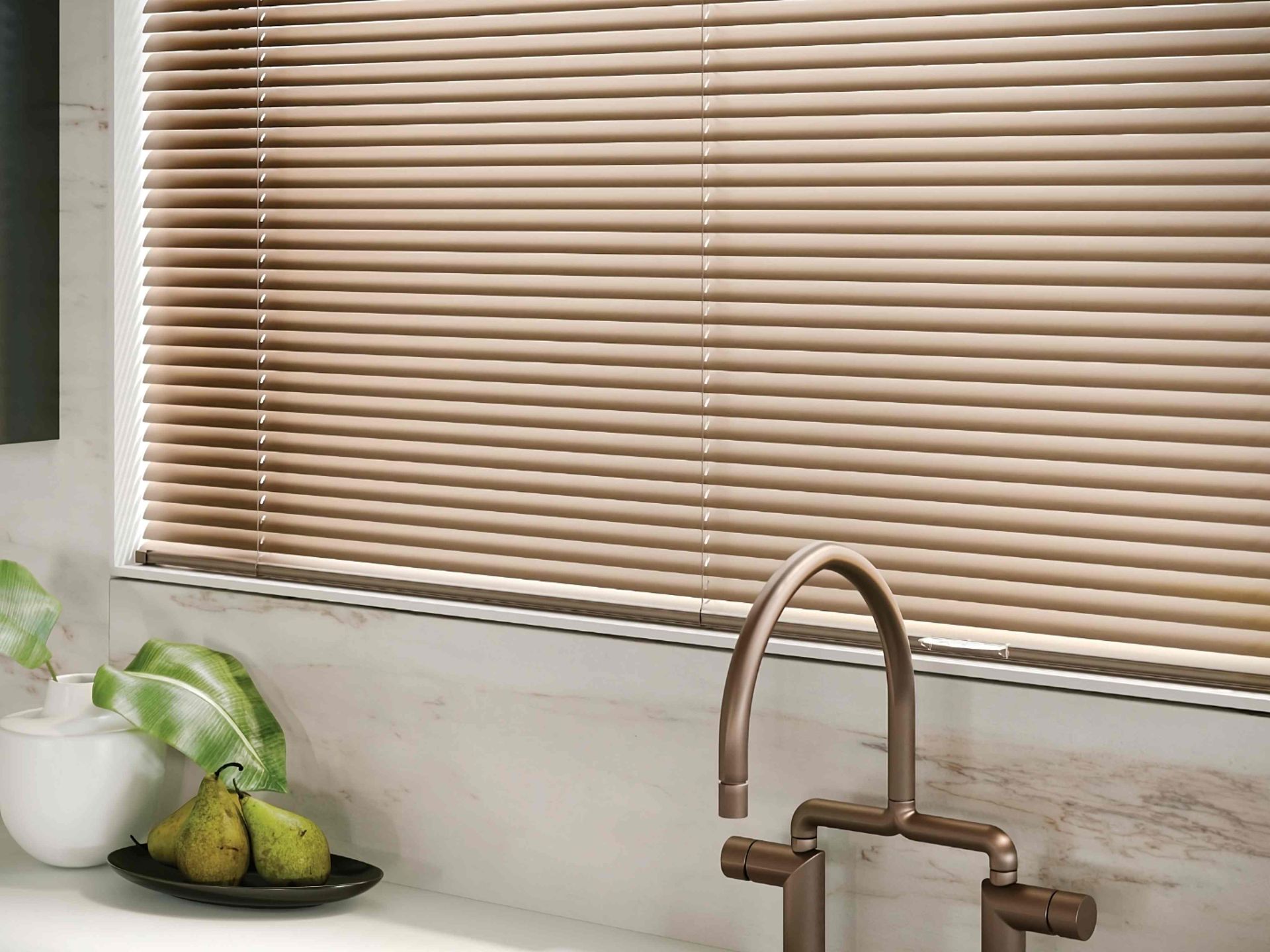 Hunter Douglas Modern Precious Metals® Mini Blinds in a dreamy copper color above a kitchen sink at The Blind Guy Lewiston near Clarkston & Pullman, WA