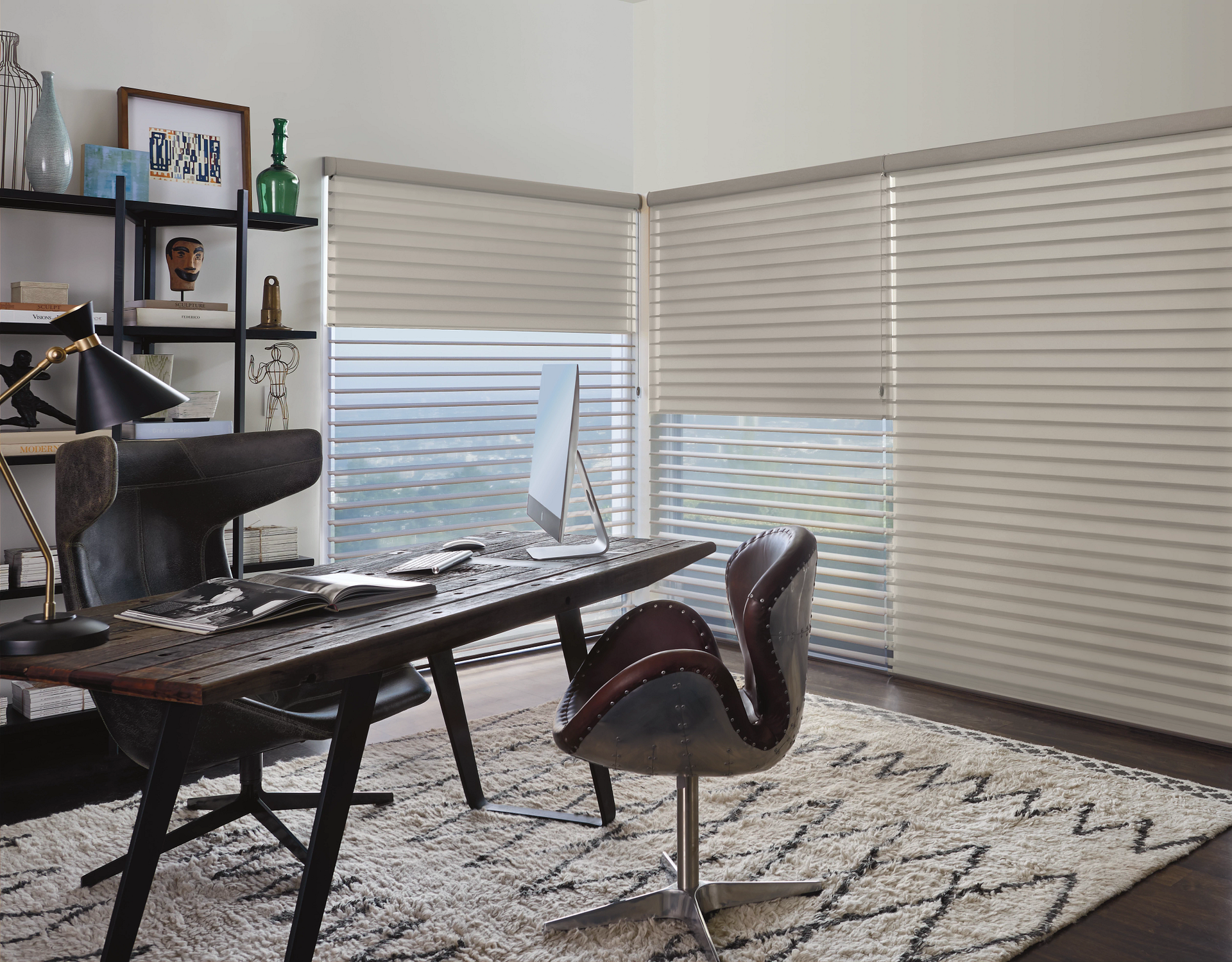 Practical and chic Hunter Douglas Silhouette® Sheer Shades on large windows in a refreshed home off