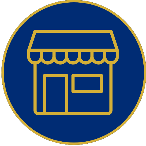 Blue circular sign with a gold outline of a storefront and awning