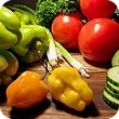 There are many different types of vegetables on the table. There are many different types of vegetables on the table.