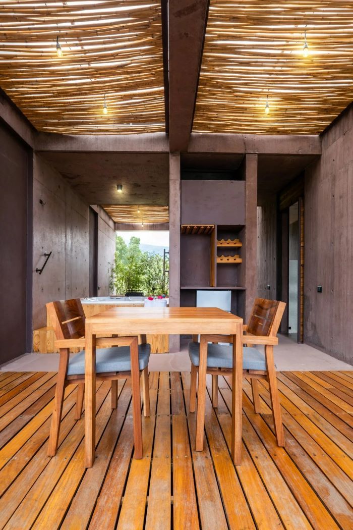 A Dining Room with A Wooden Table and Chairs — Custombuilt Furnishers in Svensson Heights, QLD