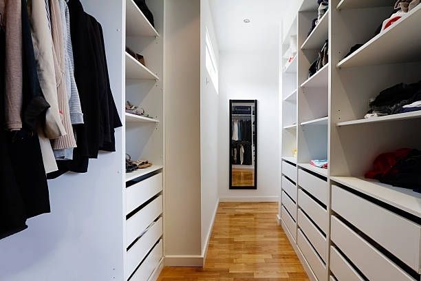 A Walk in Closet with Shelves and Drawers — Custombuilt Furnishers in Svensson Heights, QLD