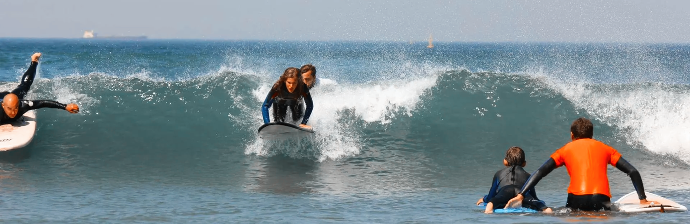 daily classes in surf, stand up paddle, surf school