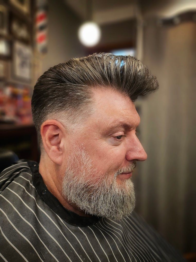 Portrait of a Bearded Man in Profile With Styled Gray Hair — Lucky Child Barber Shop In Hobart, TAS