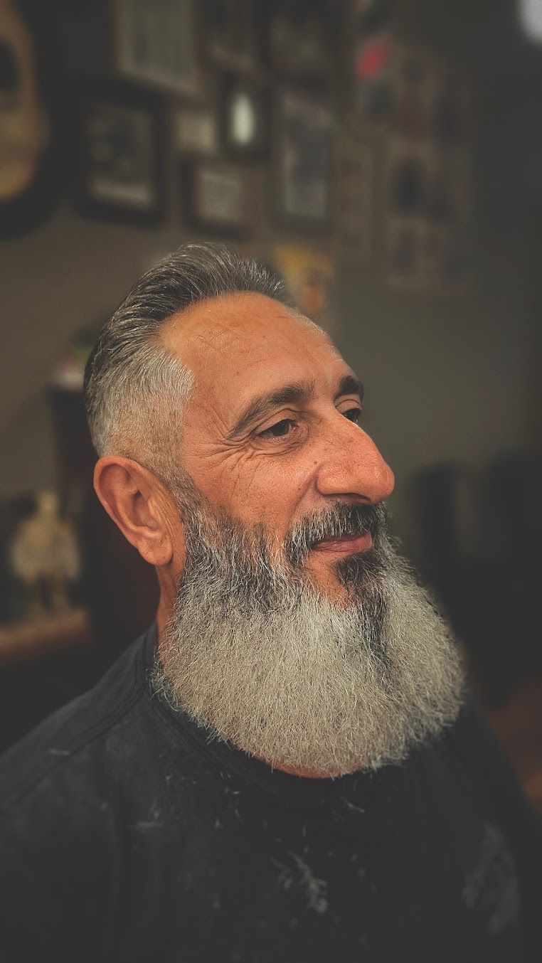 Bearded Man in a Dark Shirt — Lucky Child Barber Shop In Hobart, TAS