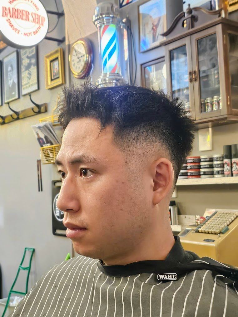 Man Getting a Haircut in a Barbershop — Lucky Child Barber Shop In Hobart, TAS