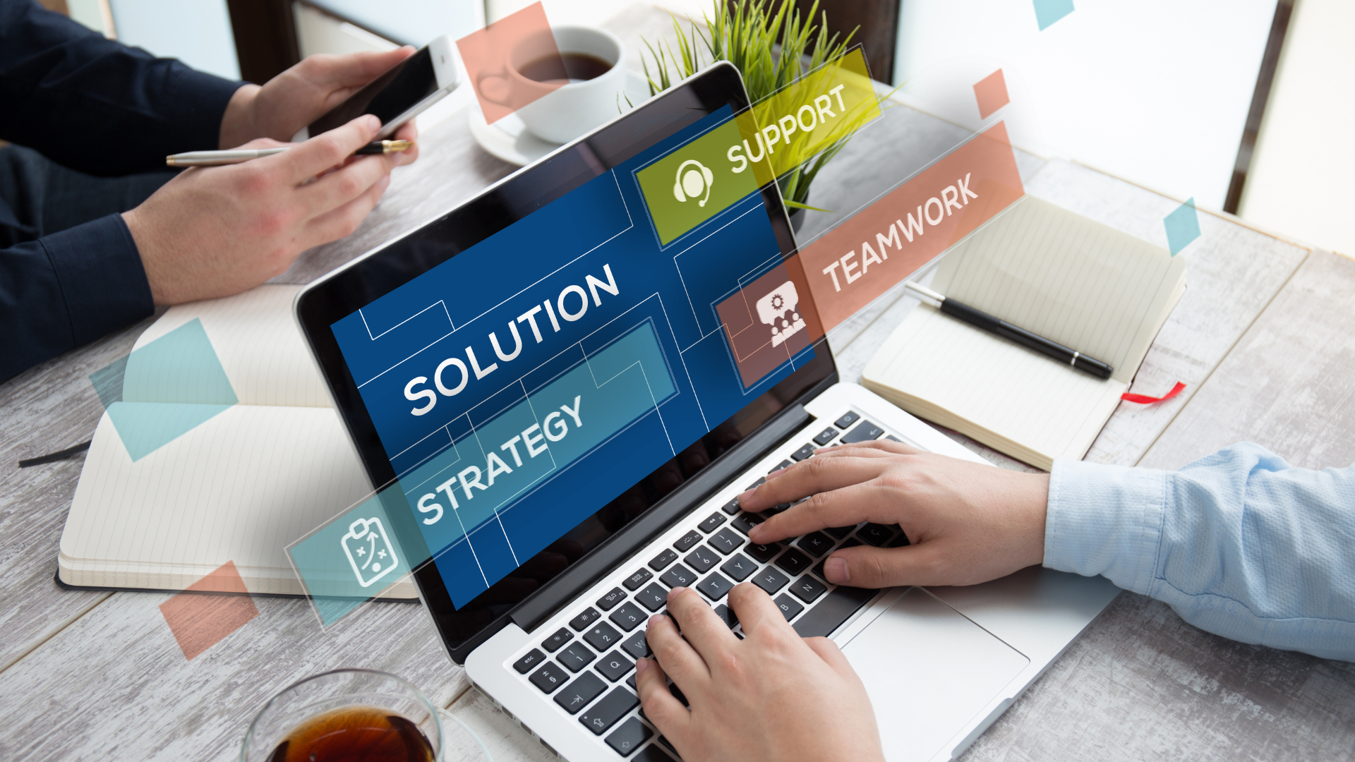 A person is typing on a laptop computer with the word solution on the screen.