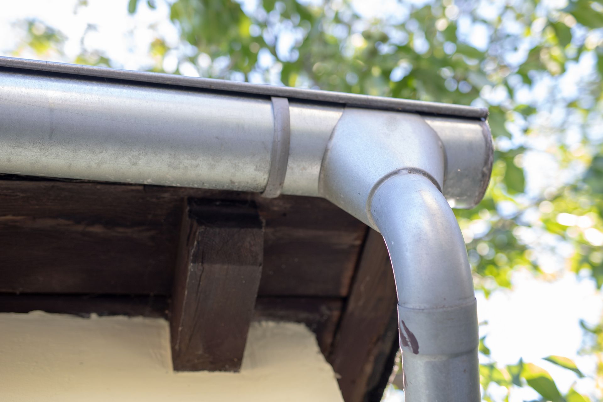 Different Florida seamless gutters materials displayed side by side