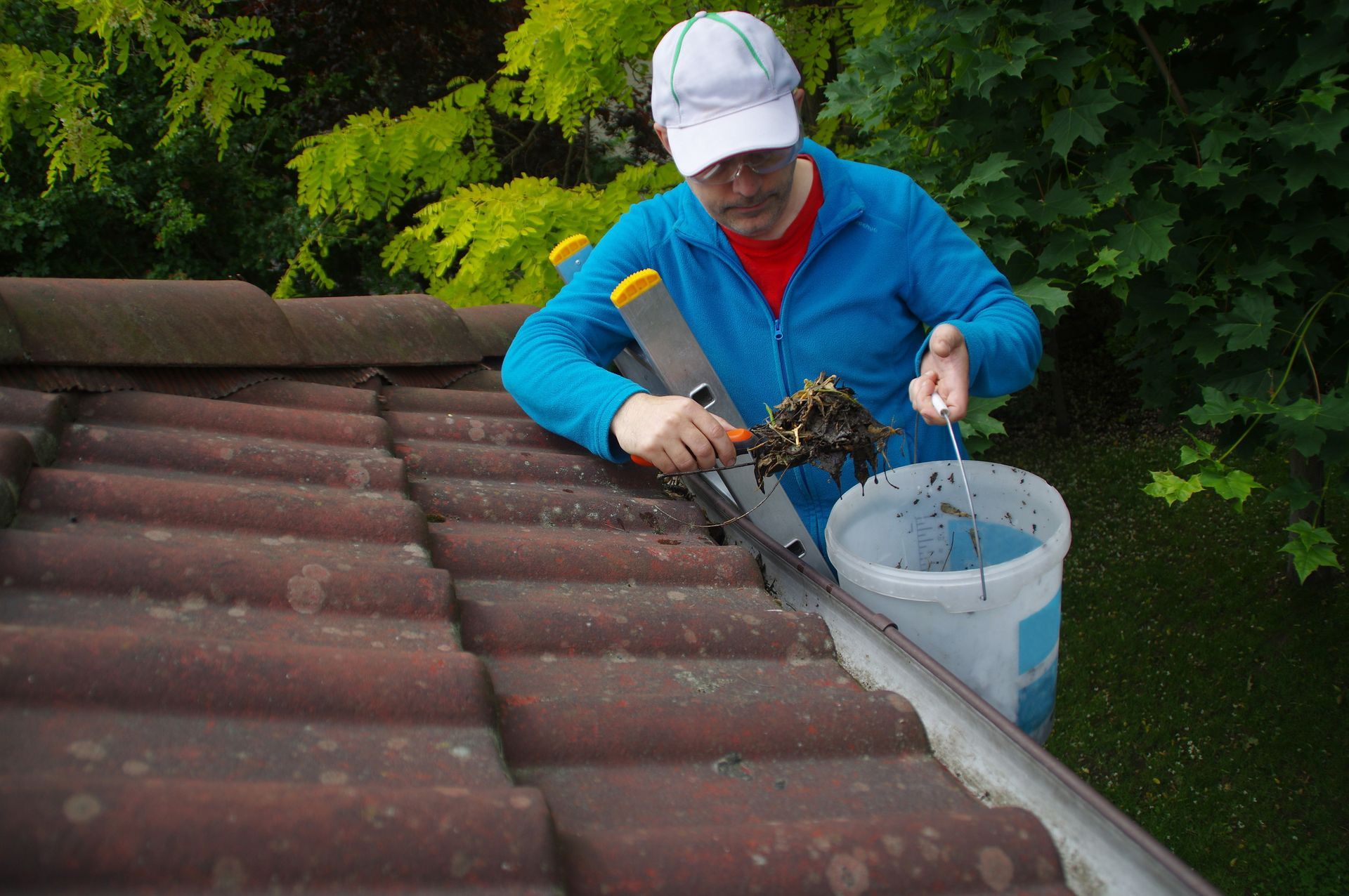 Professional gutter cleaning service improving home drainage