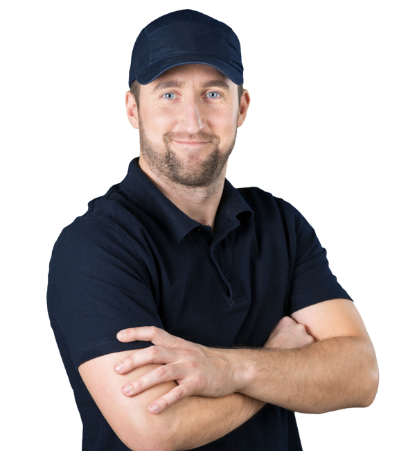 Man in dark blue cap and shirt, arms crossed, smiling.