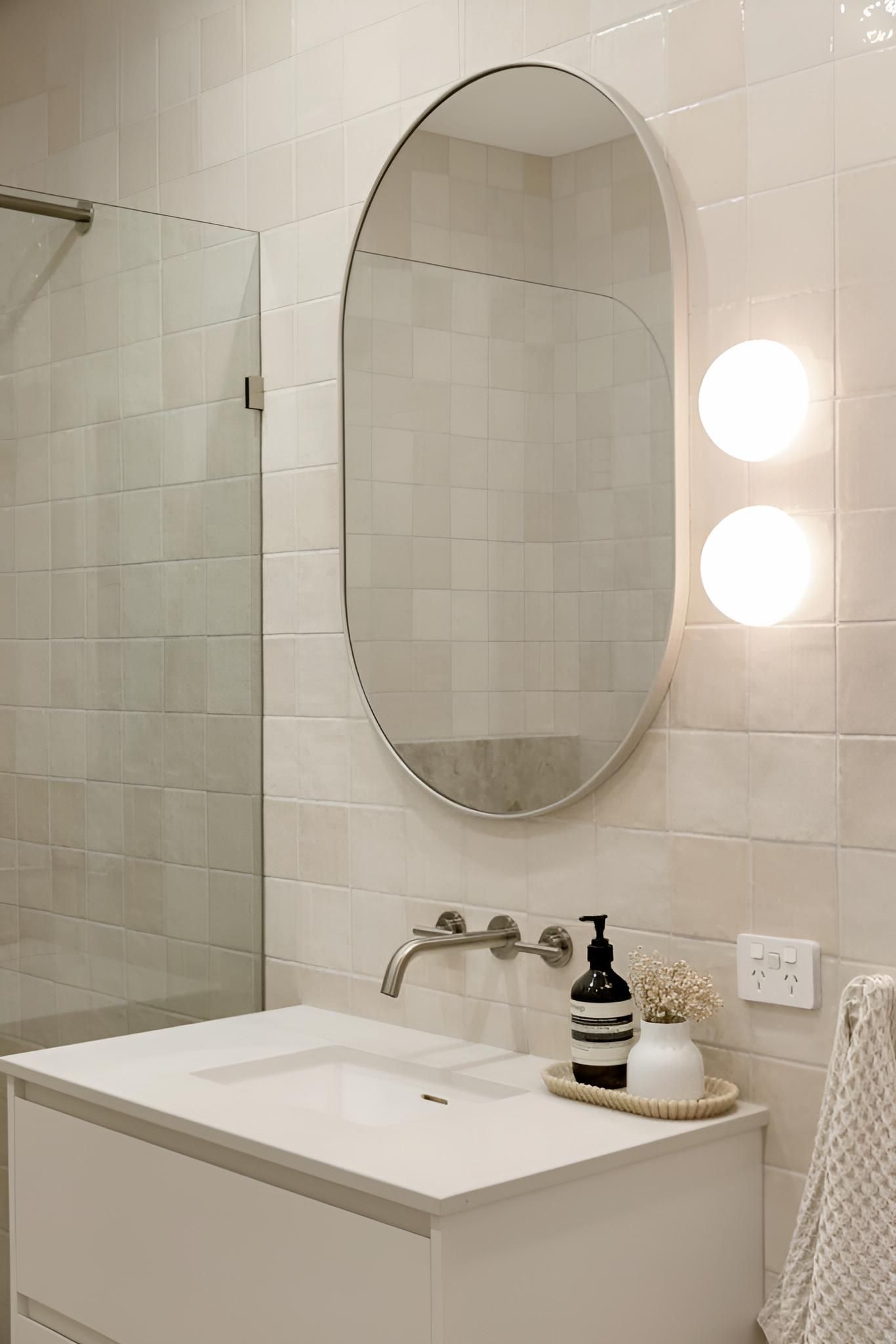 A Bathroom With a Sink, Mirror and Shower — CK Cabinetry in Coolum Beach, QLD