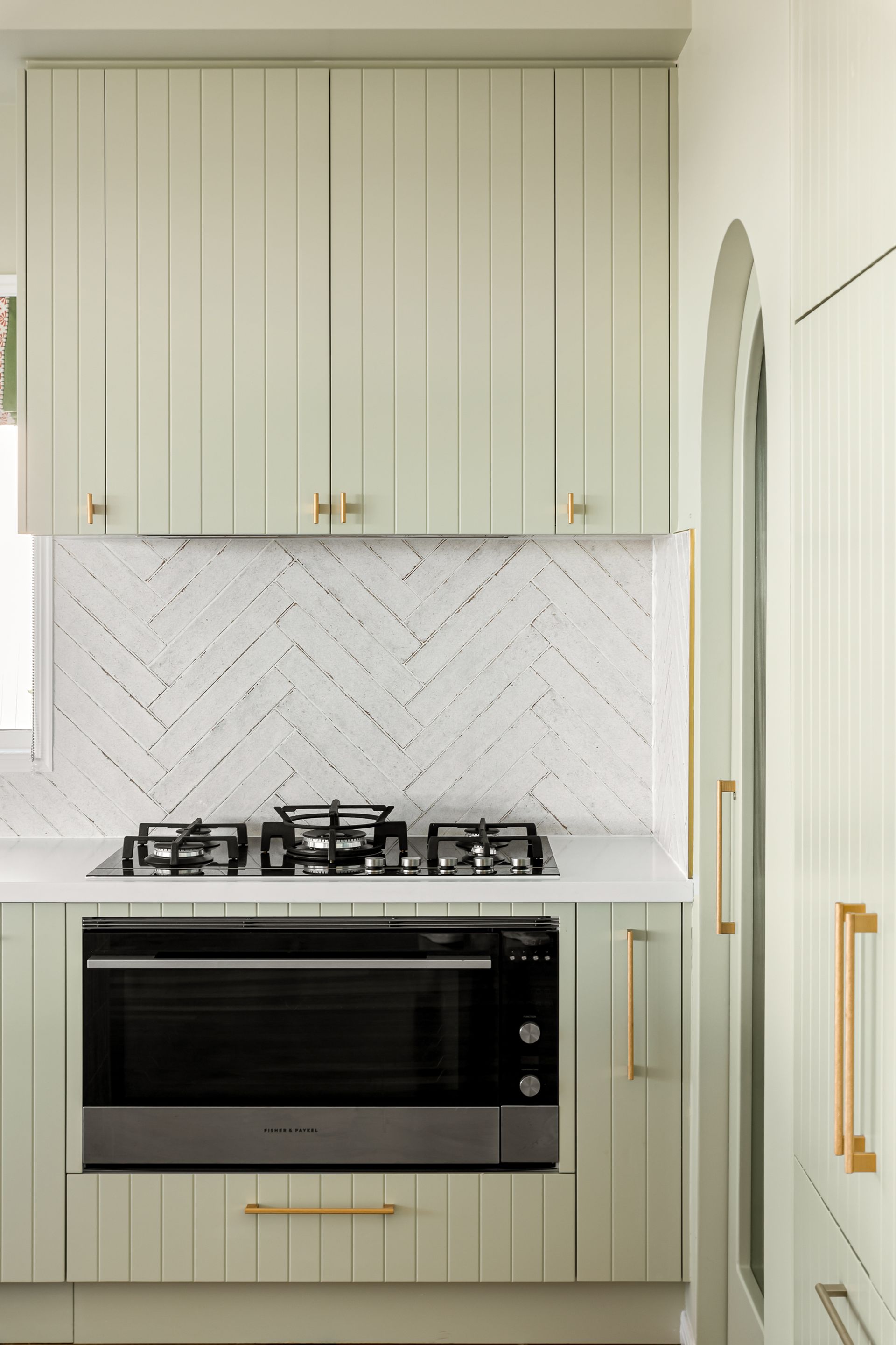 A Kitchen With Black Cabinets and White Counter Tops and a Large Island — CK Cabinetry in Caloundra, QLD