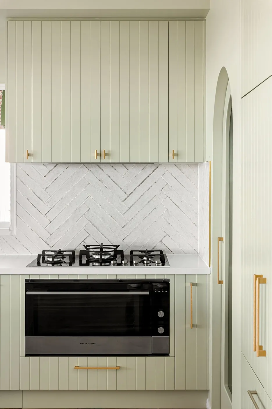 A Kitchen With Black Cabinets and White Counter Tops and a Large Island — CK Cabinetry in Caloundra, QLD