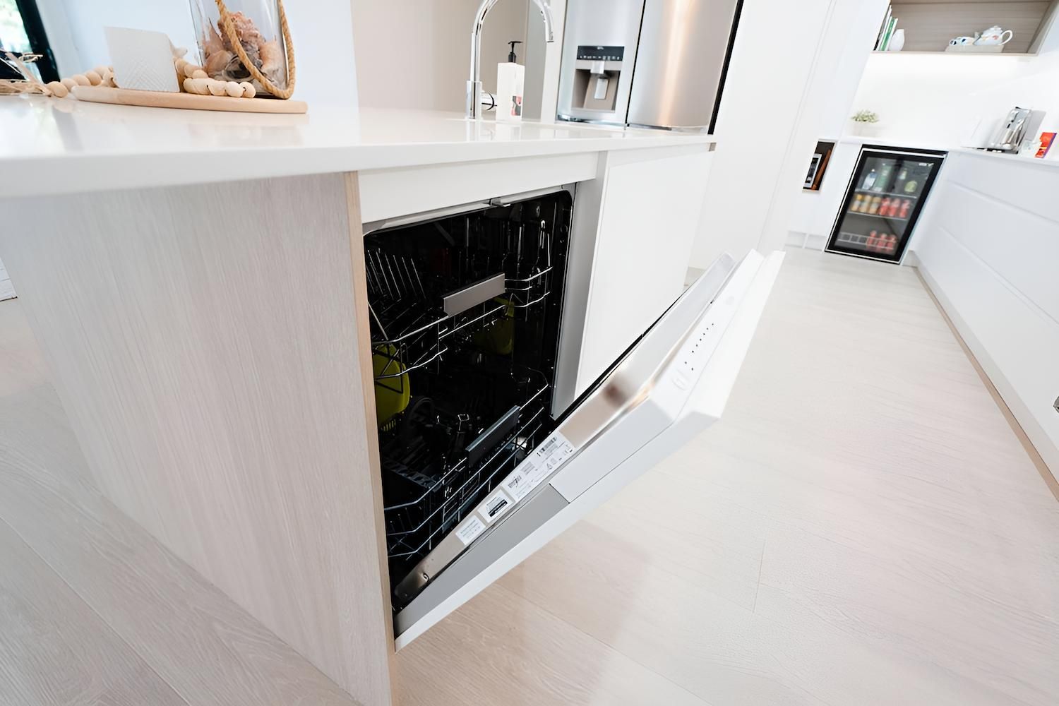 A Dishwasher is Open in a Kitchen With the Door Open — CK Cabinetry in Coolum Beach, QLD