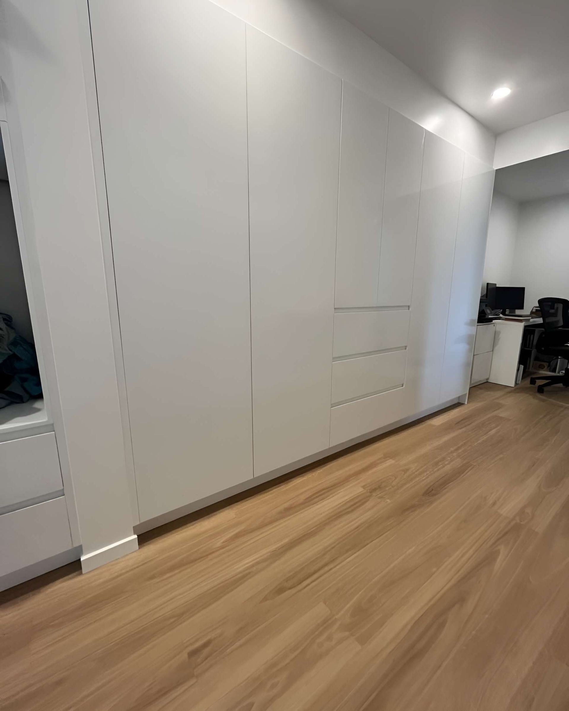 A Room With a Wooden Floor and White Walls — CK Cabinetry in Caloundra, QLD