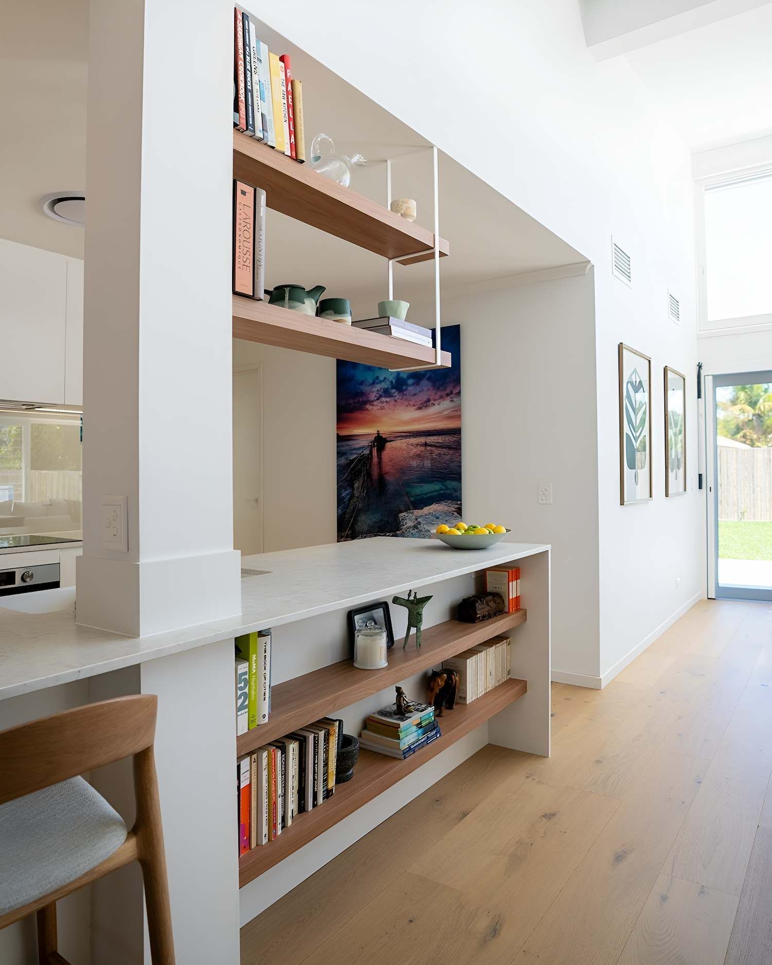 A Kitchen With Wooden Shelves and a Painting on the Wall — CK Cabinetry in Coolum Beach, QLD