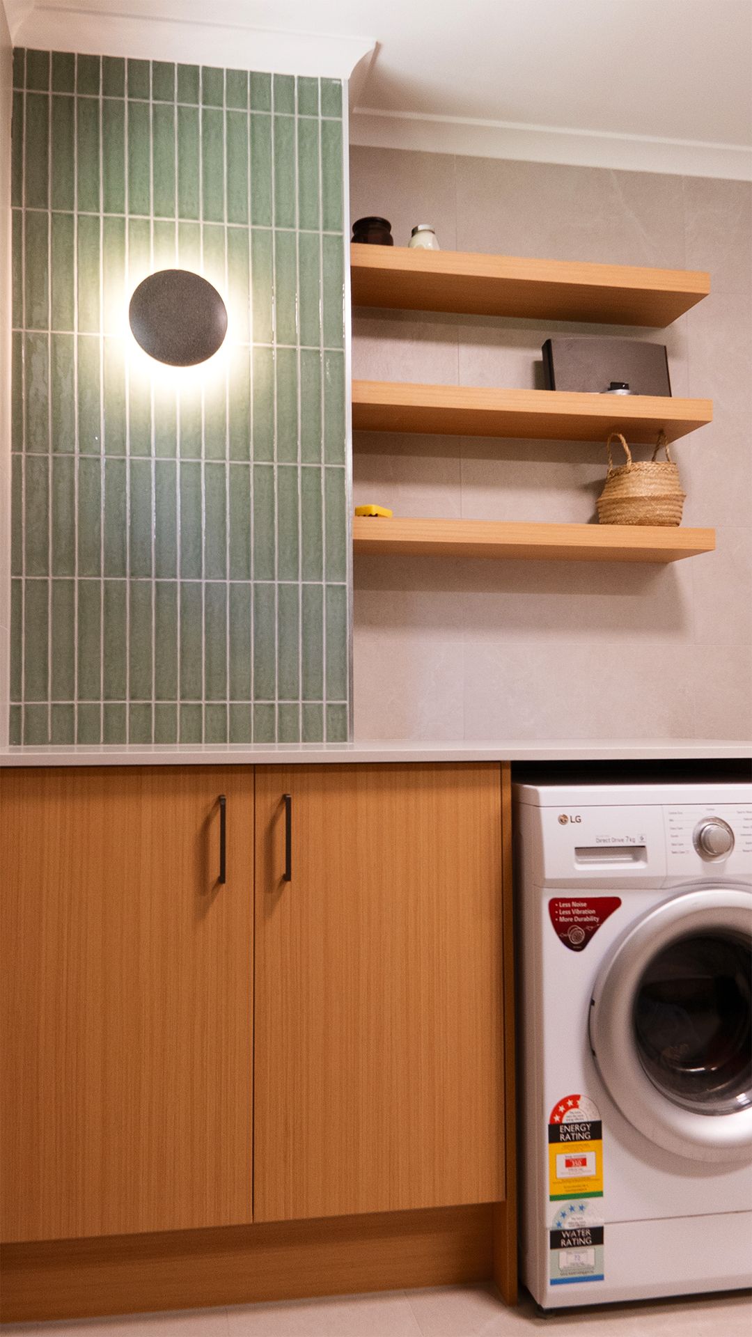 A Kitchen With White Cabinets and Wooden Floors and a Window — CK Cabinetry in Caloundra, QLD