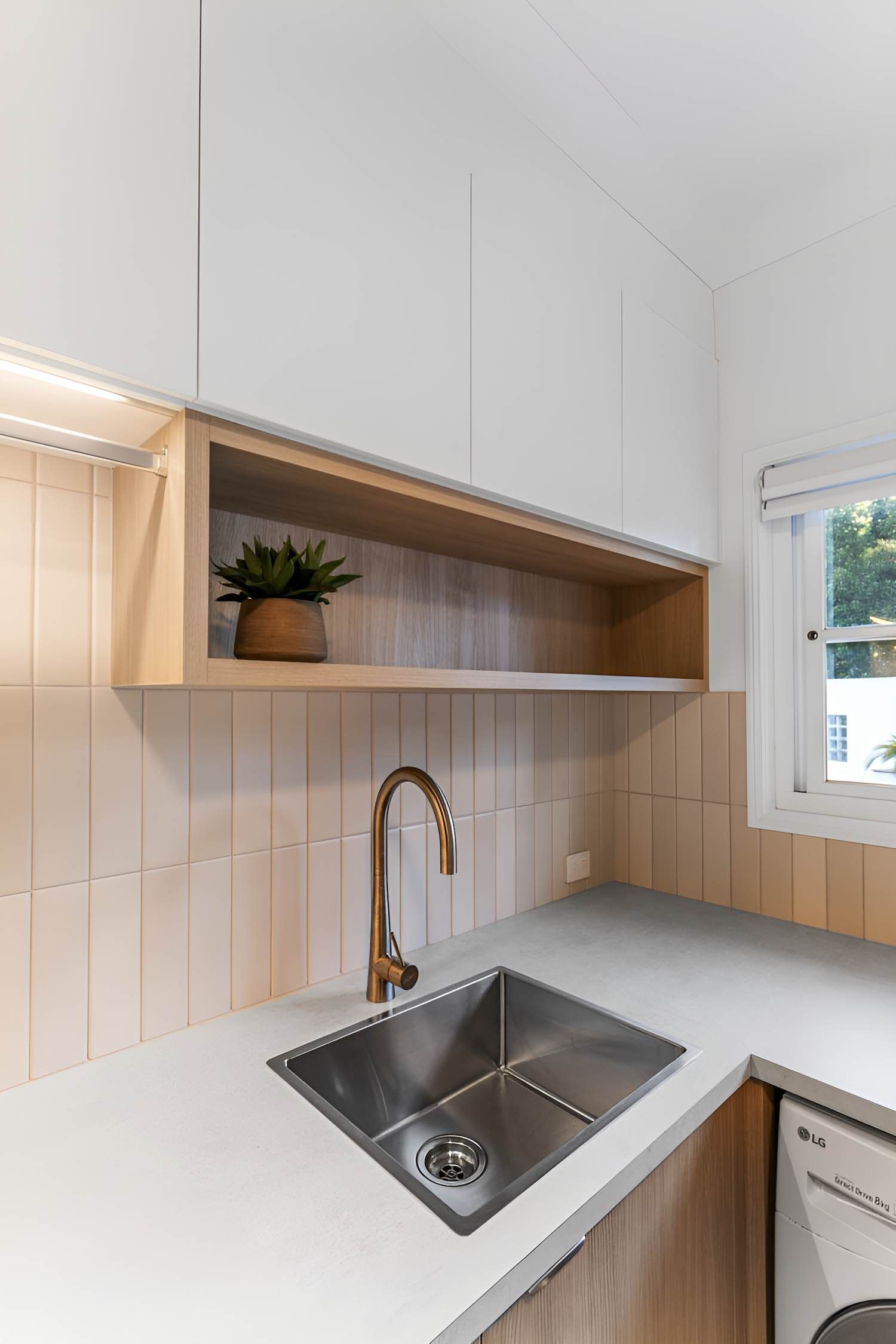 A Kitchen With a Sink, Faucet, and a Window — CK Cabinetry in Coolum Beach, QLD