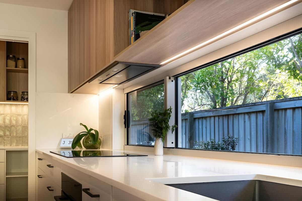 A Bathroom With Two Sinks, Two Mirrors and a Window — CK Cabinetry in Sunshine coast, QLD