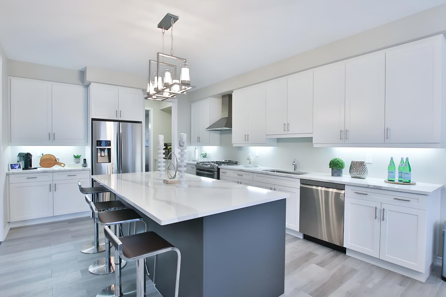 A Kitchen With White Cabinets, Stainless Steel Appliances — CK Cabinetry in Coolum Beach, QLD