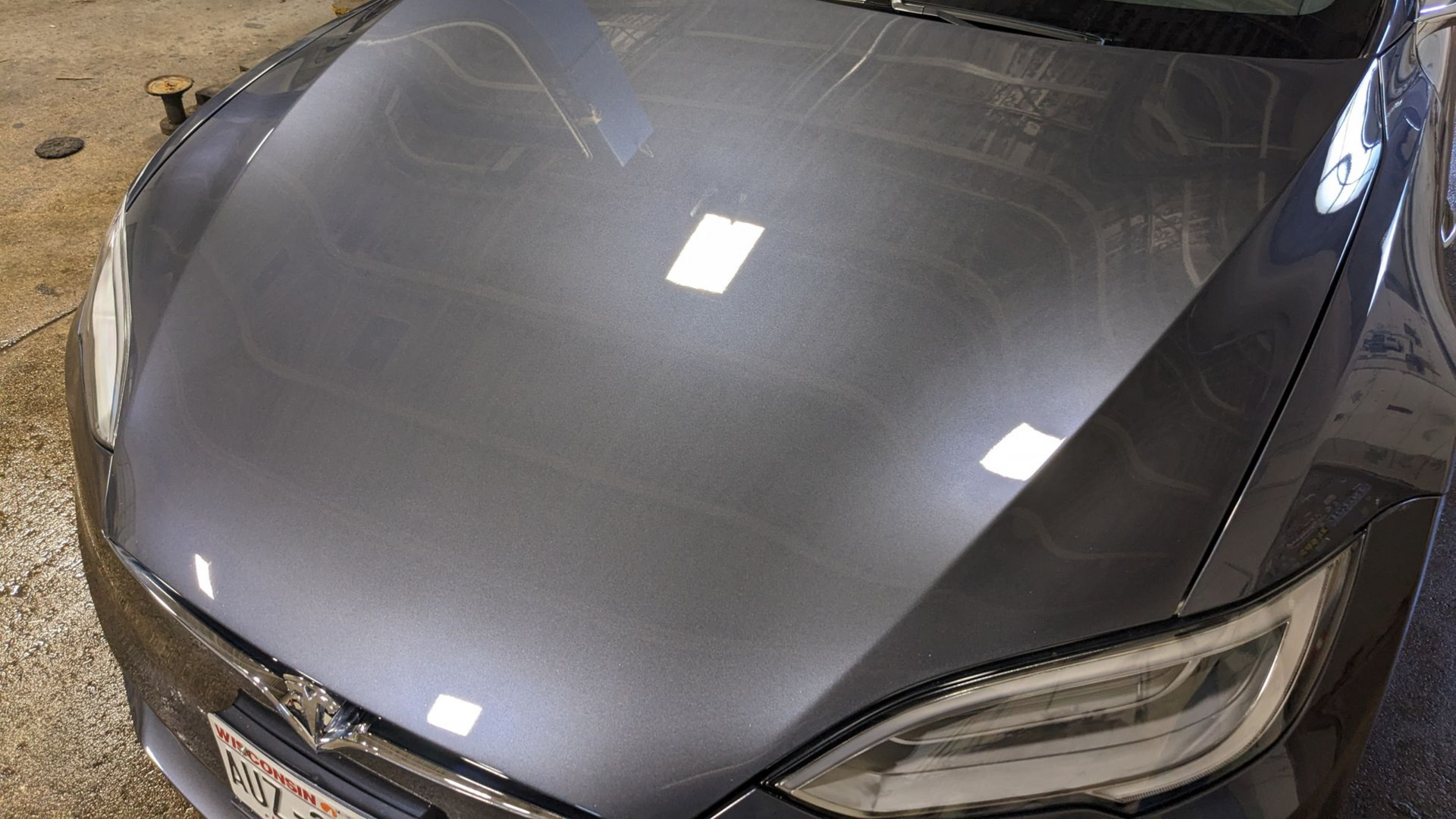 Ceramic coated hood with a glossy finish at Tidy Car in Sheboygan