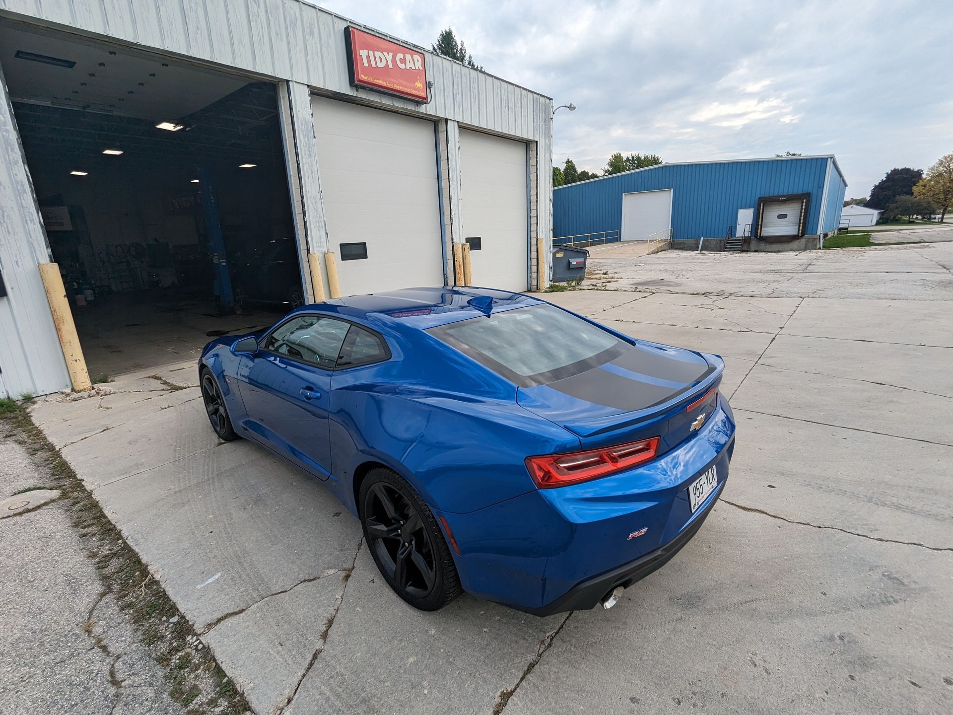 Blue car with a finished ceramic coating at Tidy Car in Sheboygan, Wisconsin