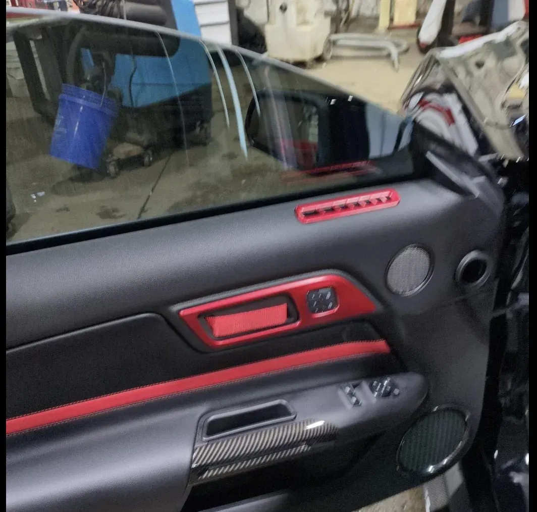 Tinted driver side window on a car at Tidy Car in Sheboygan, Wisconsin