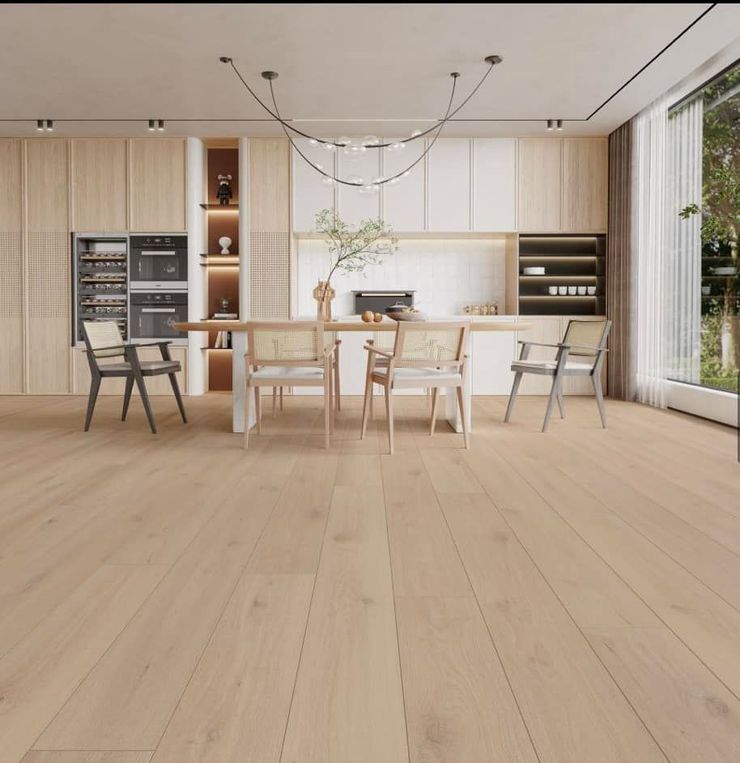 A dining room with a table and chairs in it