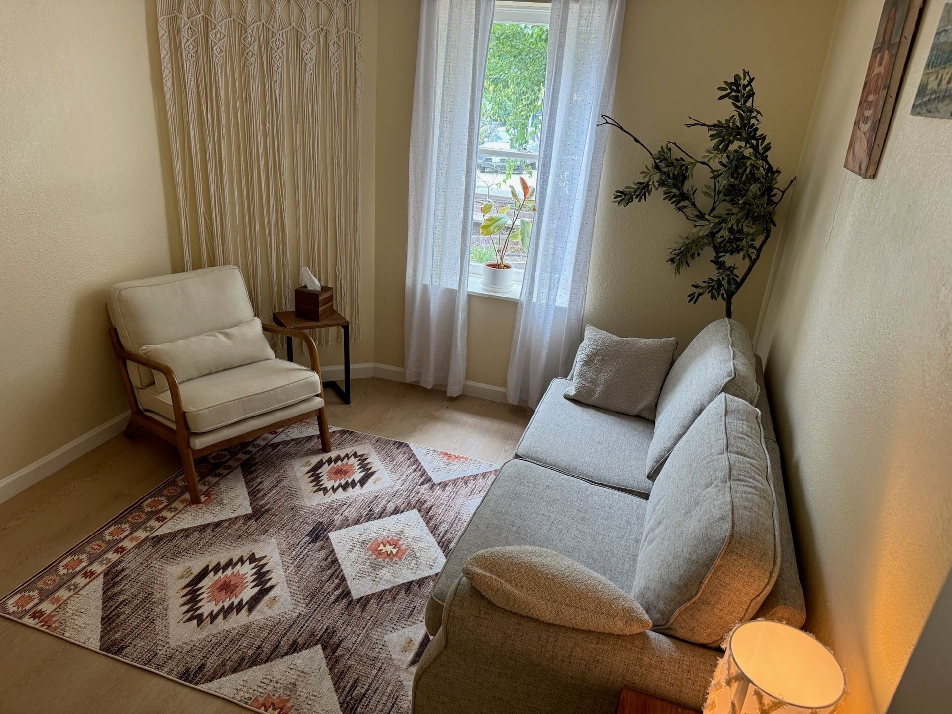Warm Oakland therapy office offering in-person sessions and online therapy for clients across California.