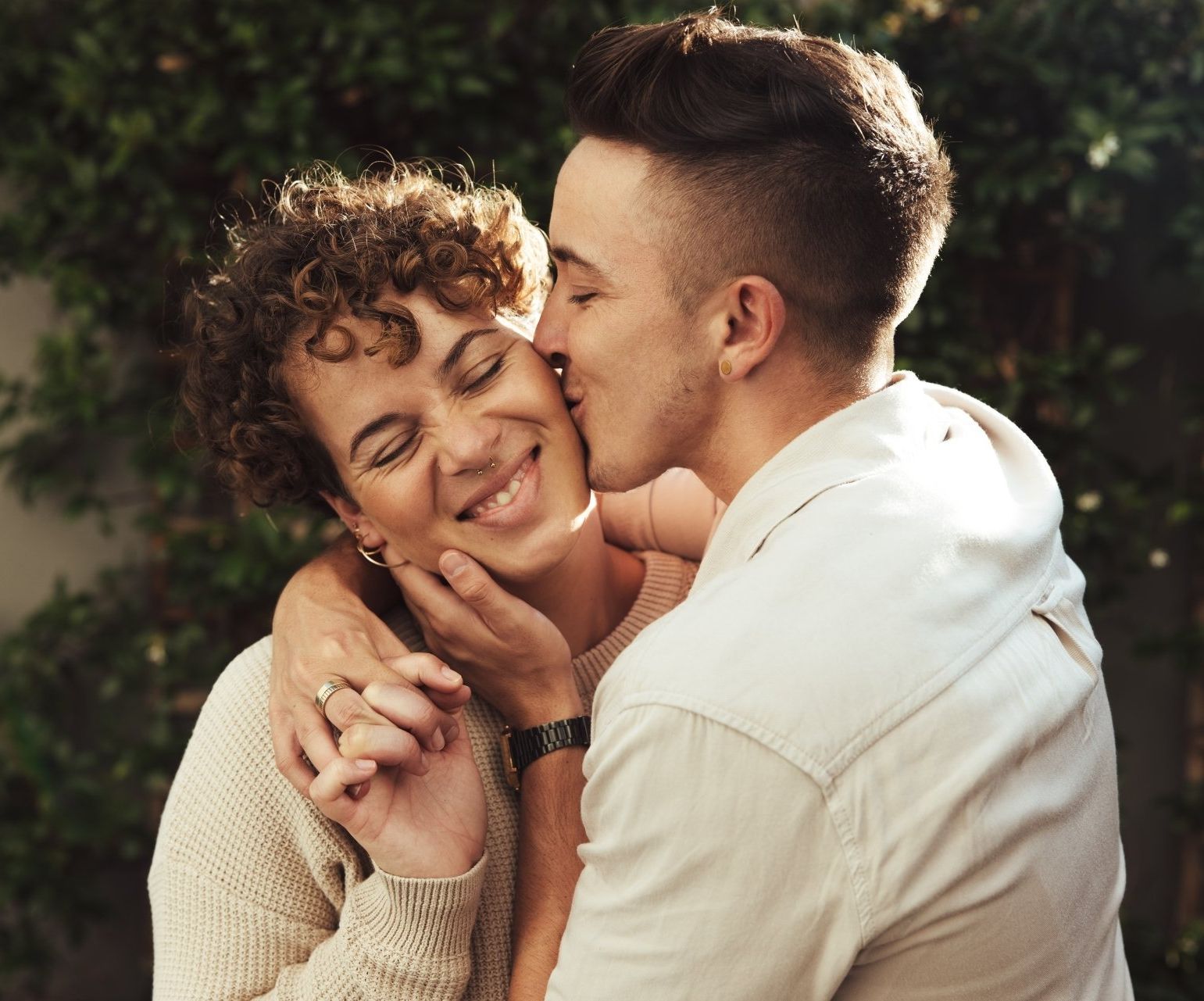 Couple embracing outdoors, symbolizing healing and connection through couples therapy in Oakland and the Bay Area.