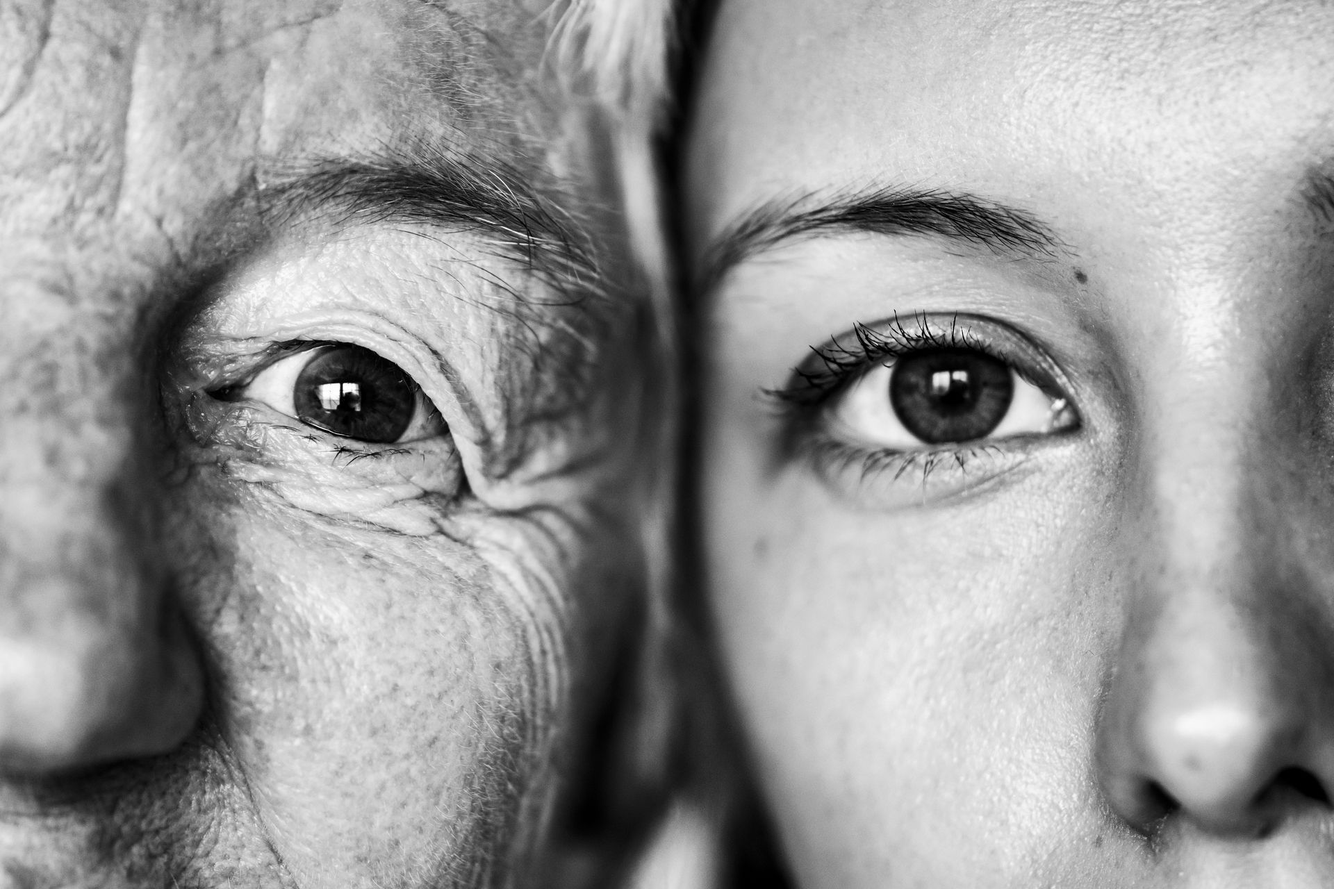 Close-up of an older and younger woman’s eyes, illustrating generational patterns explored in Oakland and Bay Area therapy.