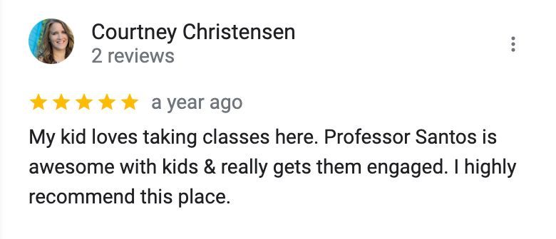 a woman is giving a review of a place on google .