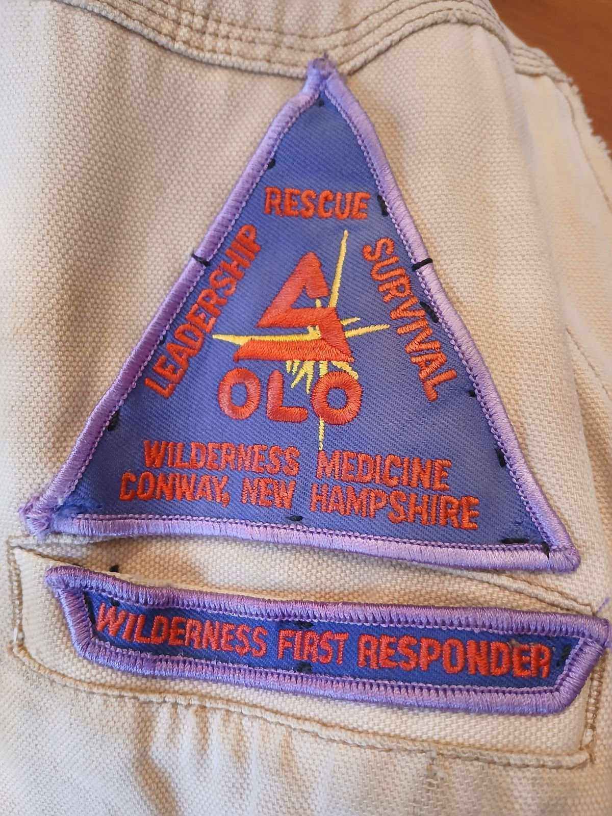 A patch that says wilderness first responder on it
